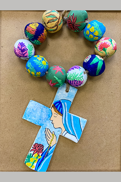 Ashley H. Christmas Art Story bracelet with crucifix
