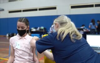 A Sydney Catholic Schools' Year 4 student gets her first COVID-19 jab