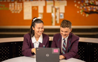 A photo showing two St Anthony of Padua Catholic College Austral students studying on their way to 2026 NAPLAN success